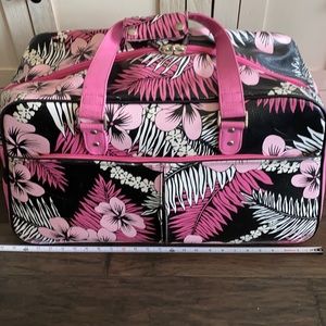 Roxy Hibiscus floral luggage roll on suitcase